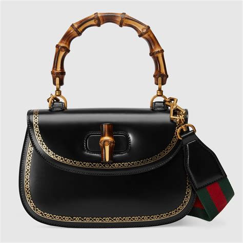 gucci logo plaque bamboo handle shoulder bag|Gucci vintage bamboo handle handbag.